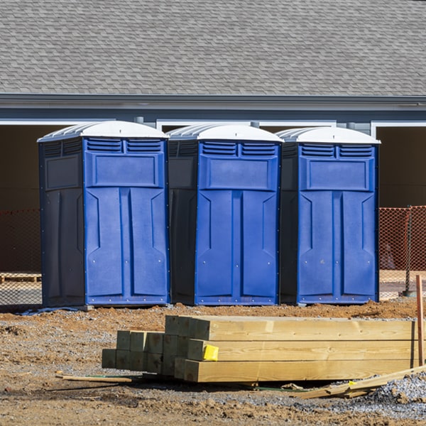 how often are the portable restrooms cleaned and serviced during a rental period in Garrett KY